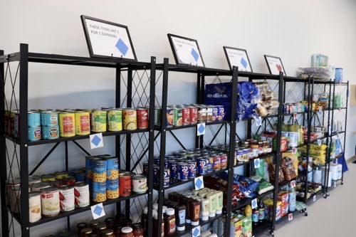 Shelving with packet food and food in cans