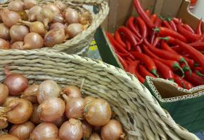 Chalotts And Chillies in brown baskets