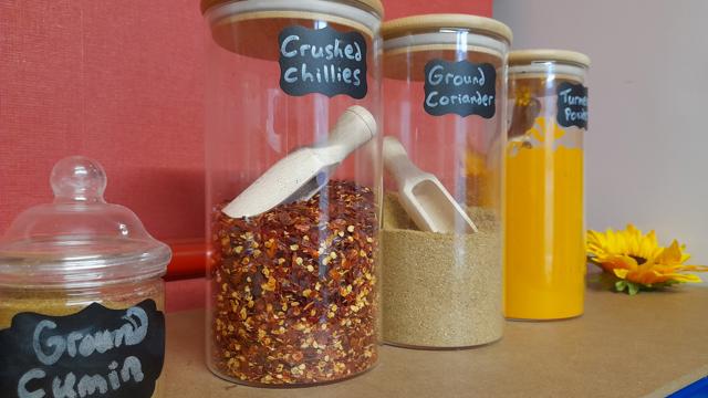 spices such as chillies in jars and labelled 