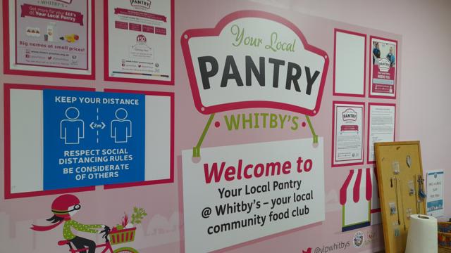 Whitbys Pantry sign on pink wall