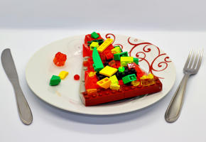 a plate with pizza made of lego