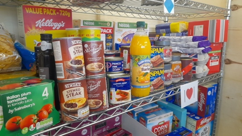 A shelf stocked with food