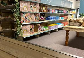 inside of a pantry with neatly stocked shelves 